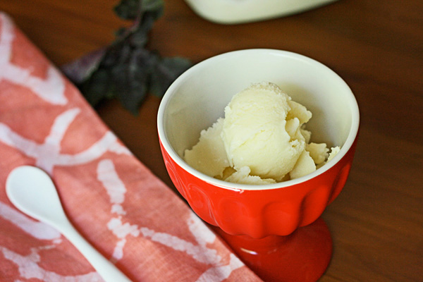 Basil Ice Cream with a strawberry balsamic sauce is a refreshing summer treat.