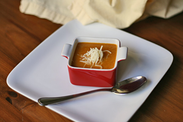 Corn Bisque - This smooth corn bisque is blended with salsa and topped with cheese.