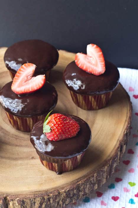 Strawberry Cupcakes - Chocolate covered strawberry cupcakes are just like the classic dessert, but in cake form.