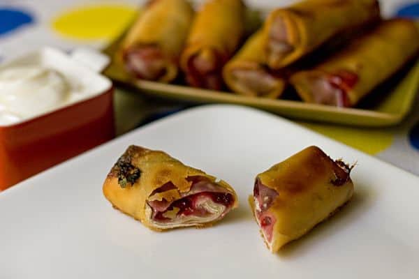 Fruit Eggrolls - Sweet cherries, raspberries, and apricots combine for a twist on Asian cuisine for these kid-friendly dessert fruit eggrolls.