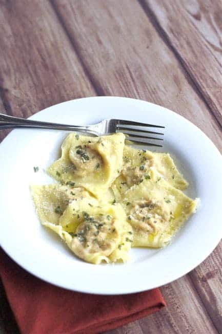 Chicken Ravioli - Homemade pasta is easier than you think - this Sundried Tomato and Chicken Ravioli makes enough for a crowd and only uses a little chicken!