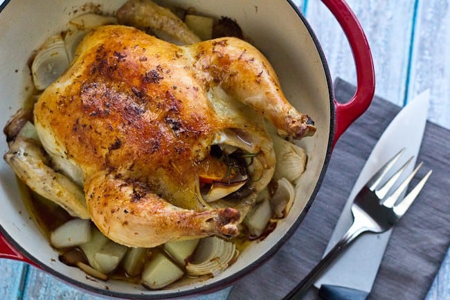 Roast Chicken - This simple recipe for roasted chicken uses seasonal orange instead of the more common lemon, and rosemary.