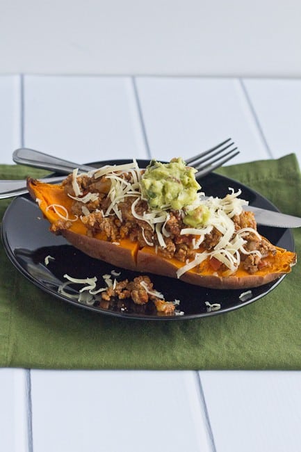 This filling recipe for Tex-Mex Sweet Potatoes aren't your mama's boring baked potato.