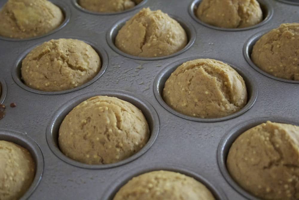 banana millet muffins in pan