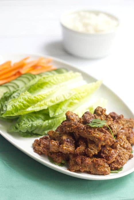 Peanut Butter Beef Satay - Peanut butter can be for dinner, too! These Marinated Peanut Butter Beef Satay lettuce wraps spice things up.