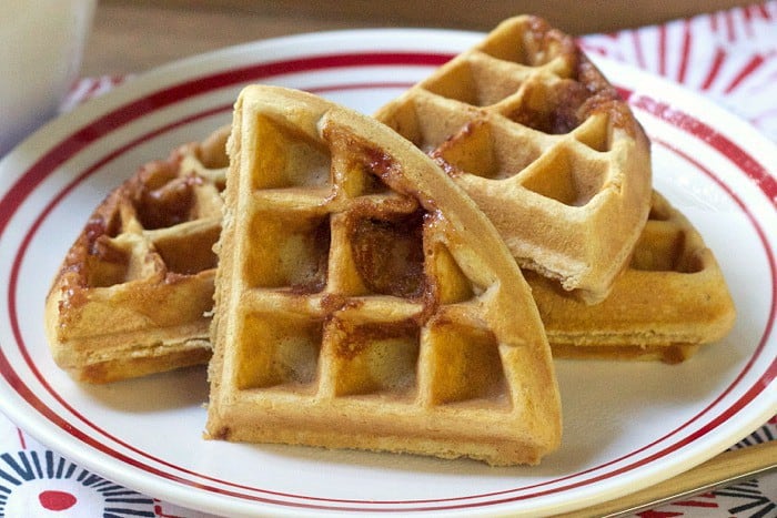 Peanut Butter and Jelly Waffles are great for eating as you rush out the door, or for packing into your picnic basket for later.