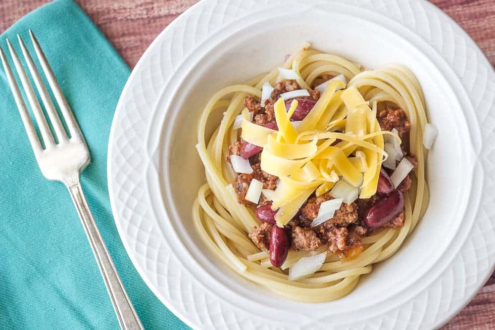 Cincinnati chili in a white bowl