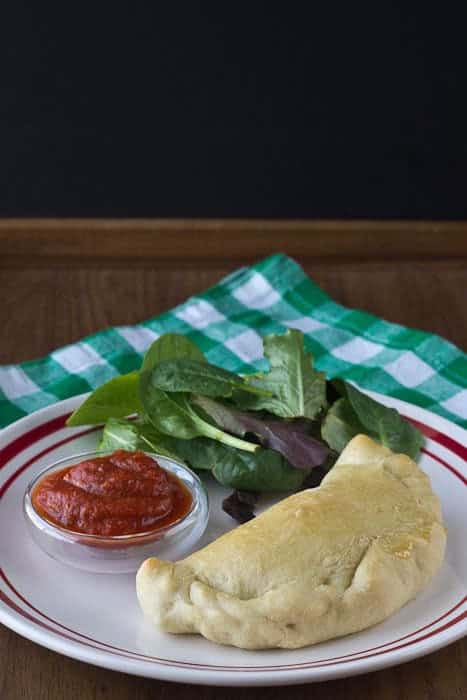 Pepperoni Calzones - Pour some syrup out for your Pawnee homies, and be sure to honor Leslie's OTP with pepperoni calzones.