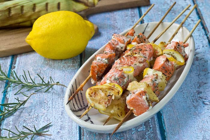 Salmon Kebabs are flavored with fresh herbs and lemon and easy to prepare for any night of the week.