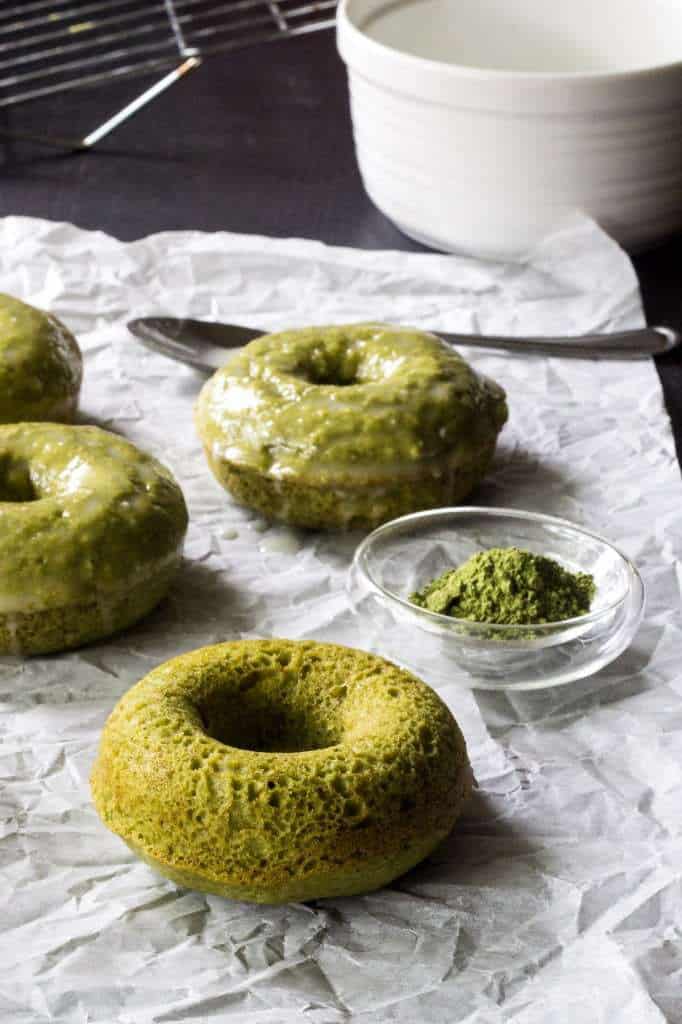 Baked matcha donuts are covered in a gingery glaze for a wake-you-up breakfast.