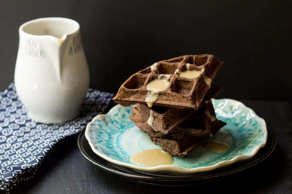 Chocolate Waffles with Whiskey Butter Sauce are perfect for a weekend indulgence.