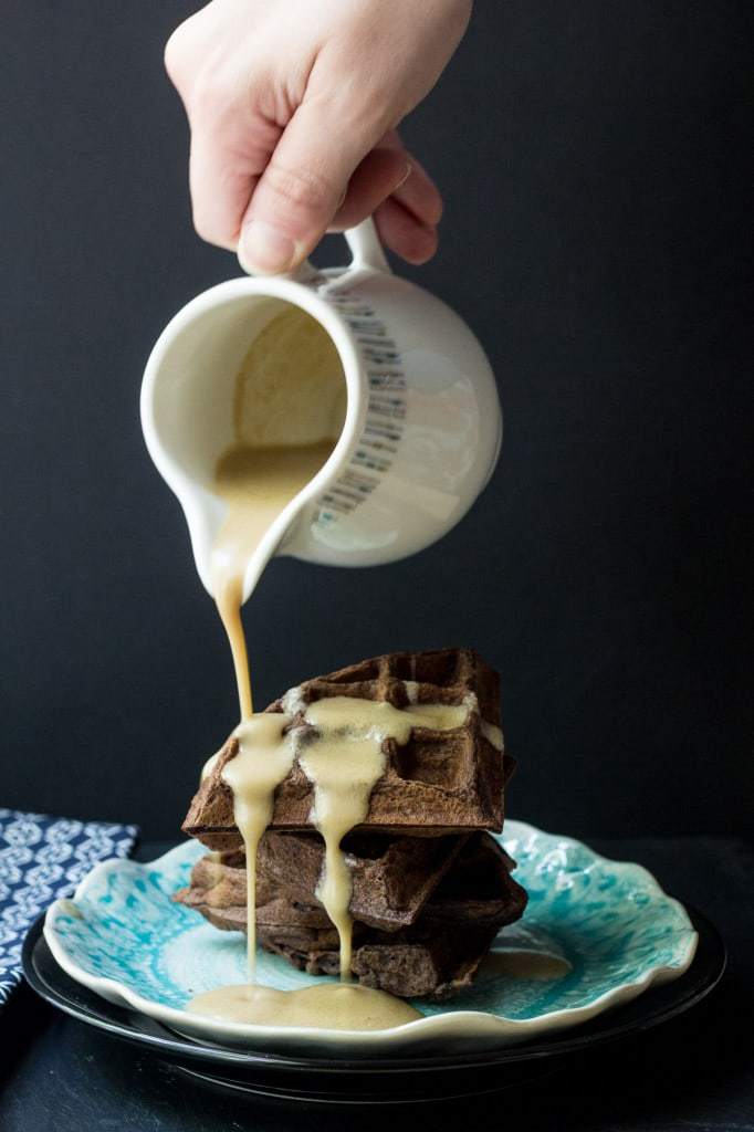 Chocolate Waffles with Whiskey Butter Sauce - Indulge this weekend with these brunch-worthy Chocolate Waffles with Whiskey Butter Sauce.