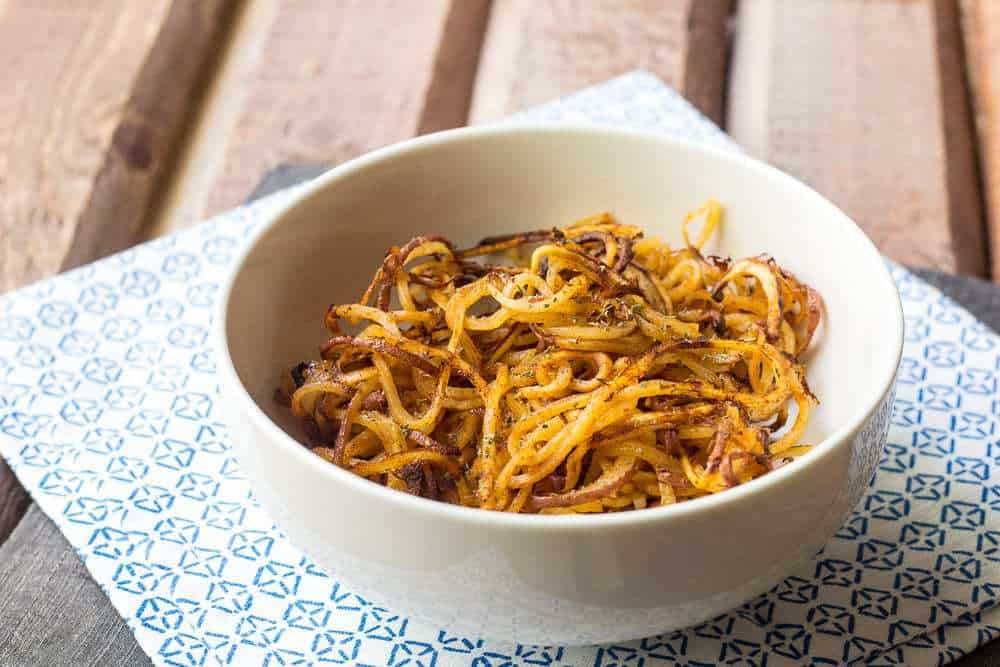 Spicy spiralized potatoes make the common spud exciting again.