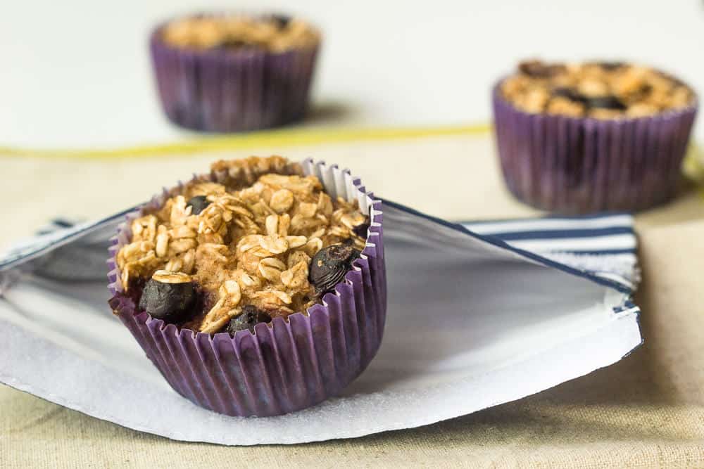 Baked Blueberry Oatmeal Cups - Breakfast will be ready for the whole week when you bake up a batch of these oatmeal cups.