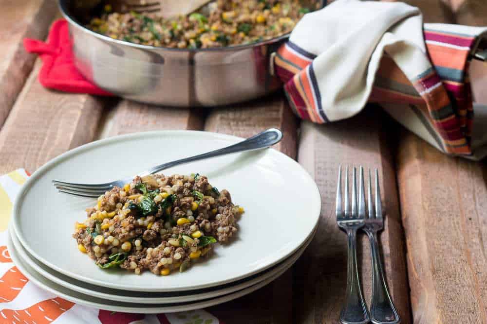 Bison One-Pot Dinner - Dinner is easy with this simple bison one-pot dinner, filled with harvest grains and wilted greens.