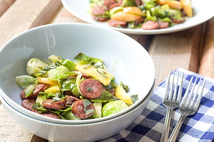 Beer-glazed sausage with Brussels sprouts and apples is an easy dinner that features plenty of fall flavors.