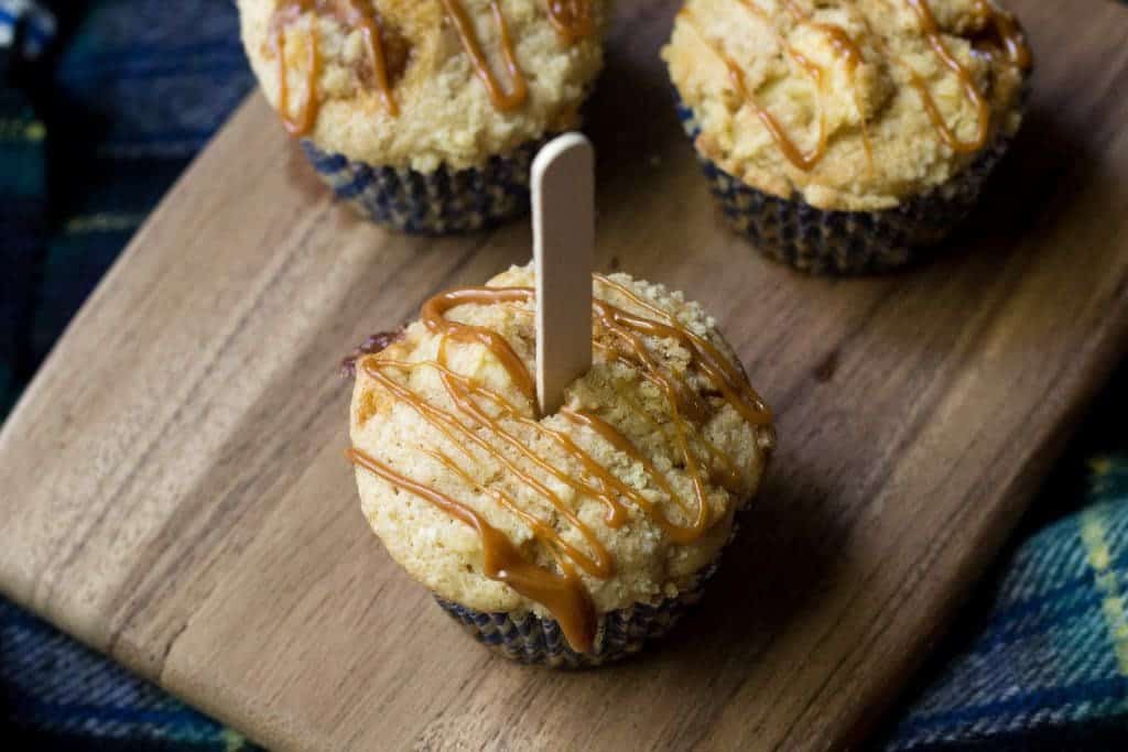 Caramel Apple Muffins are completely bursting with apple chunks, with bits of caramel tucked in here and there.