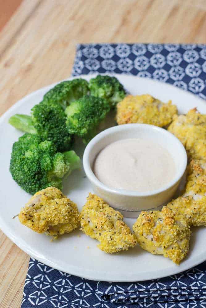 turkey nuggets on a plate with sauce 