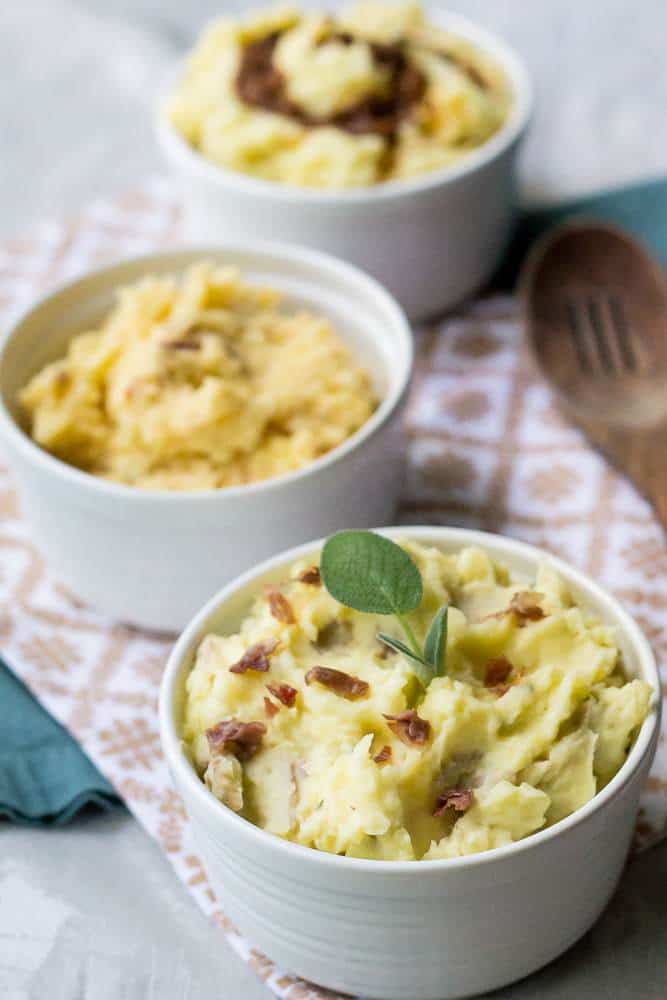 three bowls of flavored mashed potatoes