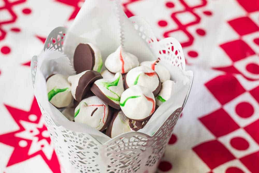 Peppermint meringue kisses are a light, sweet treat that will round out your holiday cookie tray.