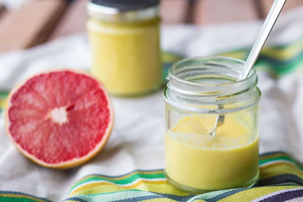 Tangy grapefruit curd can be made at home in minutes! Add a dollop to your breakfast biscuit and indulge.