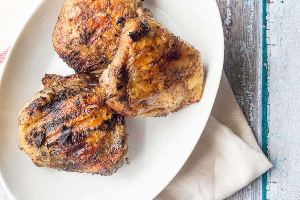 Rum jerk chicken using flavorful chicken thighs are a hit for your next cookout.