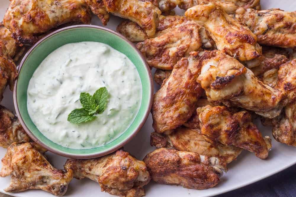 Baked tandoori chicken wings are a great snack to enjoy while watching the game. 