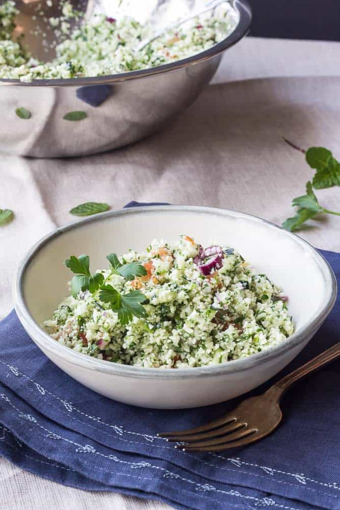 Raw cauliflower tabouli is a zesty gluten free and vegan side dish. 