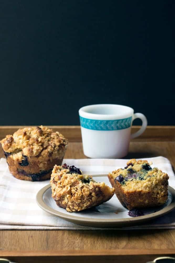 Blueberry streusel muffins are bursting with berries and topped with a crunchy oatmeal streusel.