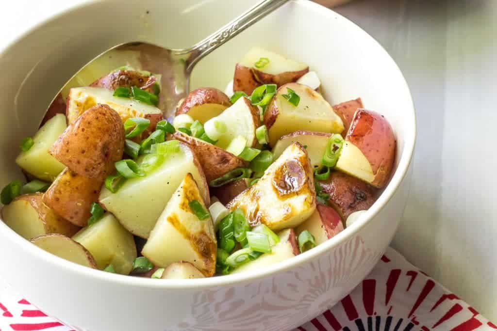 Lemony grilled potato salad is a bright side dish that is perfect for summer.