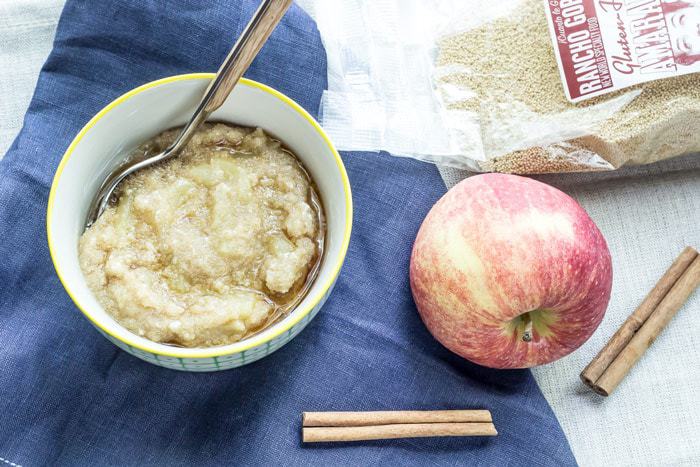 Amaranth porridge sitting in a bowl with a spoon