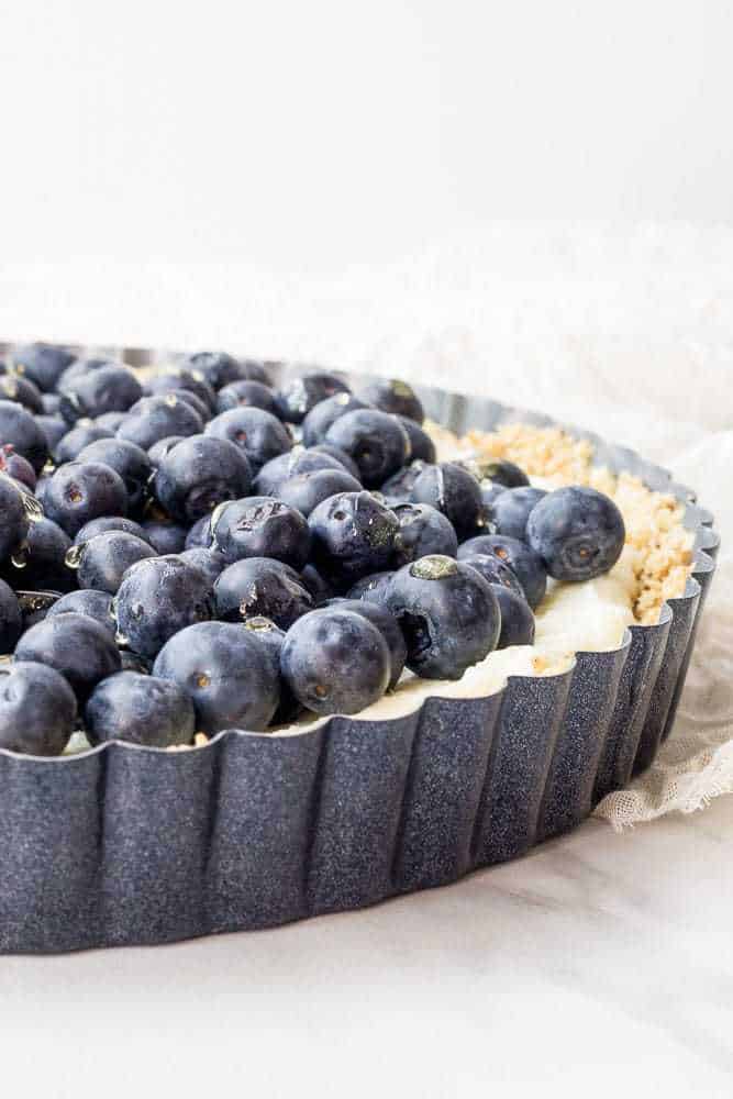 This blueberry white chocolate tart features a no-bake crust and luscious mascarpone cheese. It's perfect for the Fourth of July.