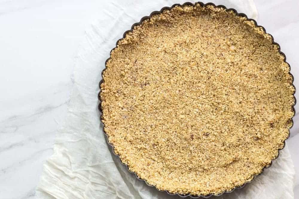 This no bake crust uses almonds, graham crackers, and coconut oil for a lightly sweet and nutty taste.