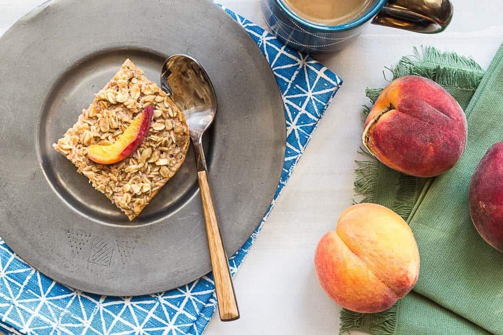 Baked peach oatmeal is a sweet make-ahead breakfast.