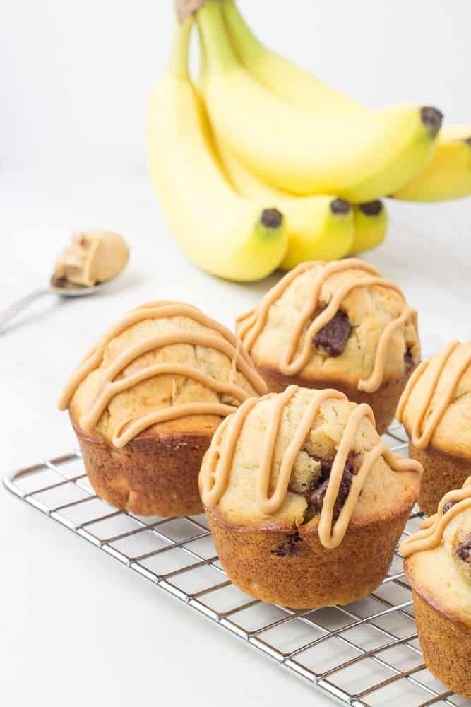 Chunky monkey muffins are a delicious morning treat. Filled with peanut butter, chocolate, and bananas, the whole family will love them!