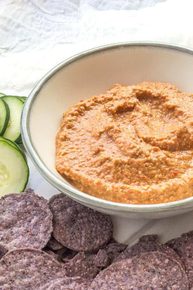 Muhammara is a dip made with roasted red peppers and walnuts for a wonderful accompaniment to vegetables, pita, and more.
