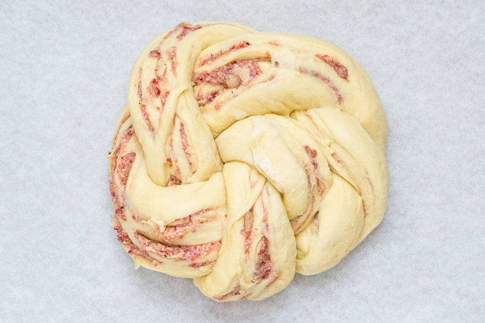 Cranberry breakfast bread is swirled with sweet cranberry sauce.