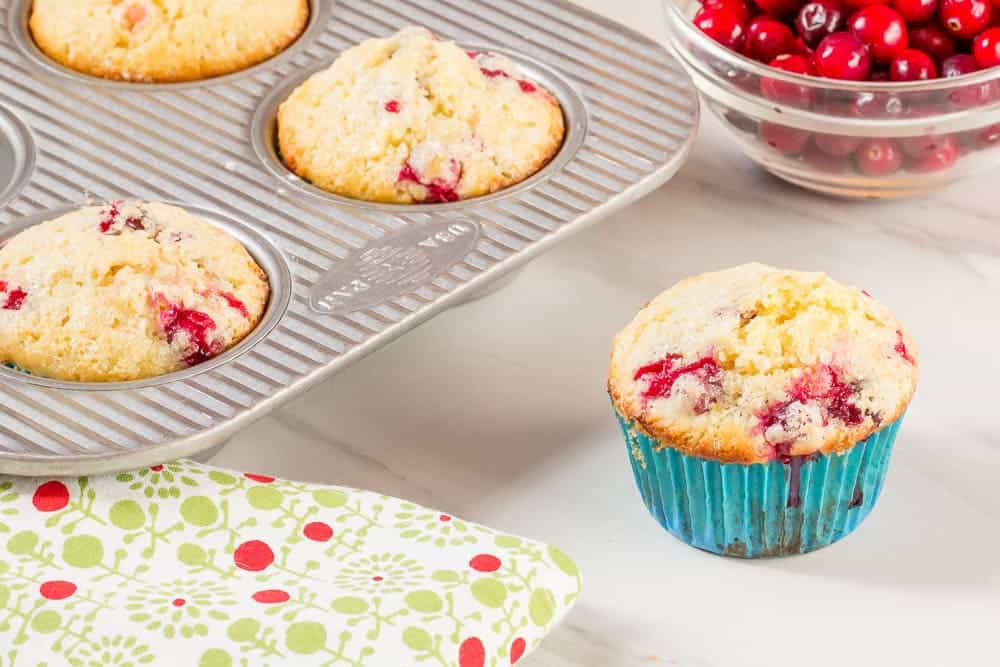 Cranberry orange muffins are tart and sweet, perfect with a cup of tea.