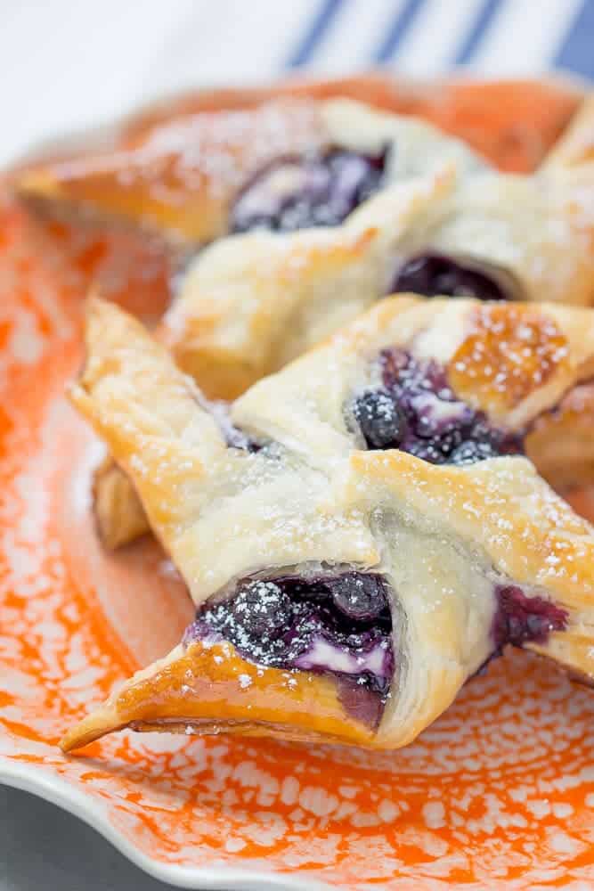 Blueberry cream cheese danishes are easily made at home thanks to puff pastry.