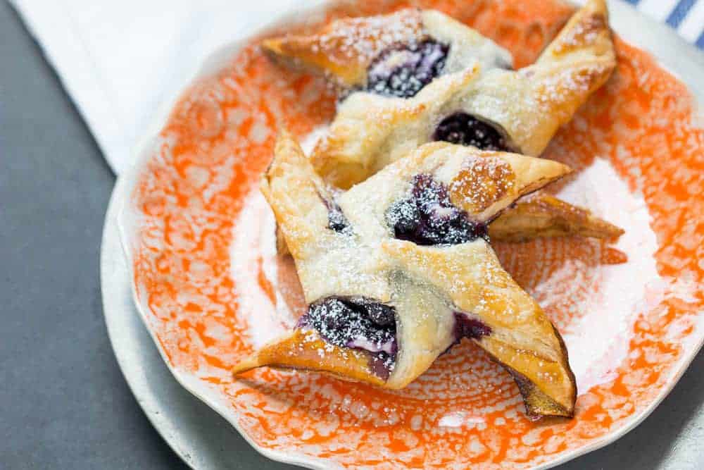 Blueberry cream cheese danishes are made easy at home with puff pastry. Skip that donut shop pastry!