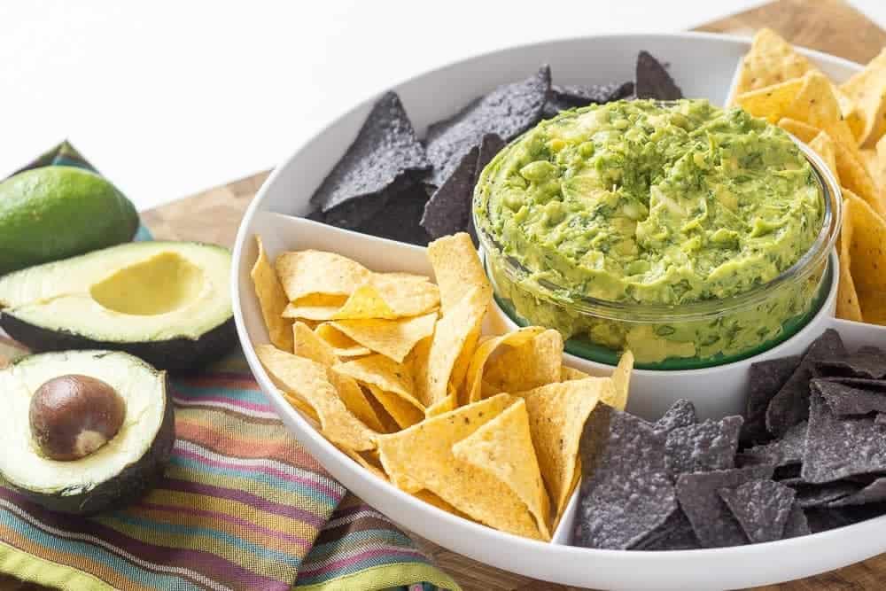 Roasted garlic guacamole is perfect for any party, any time of year.