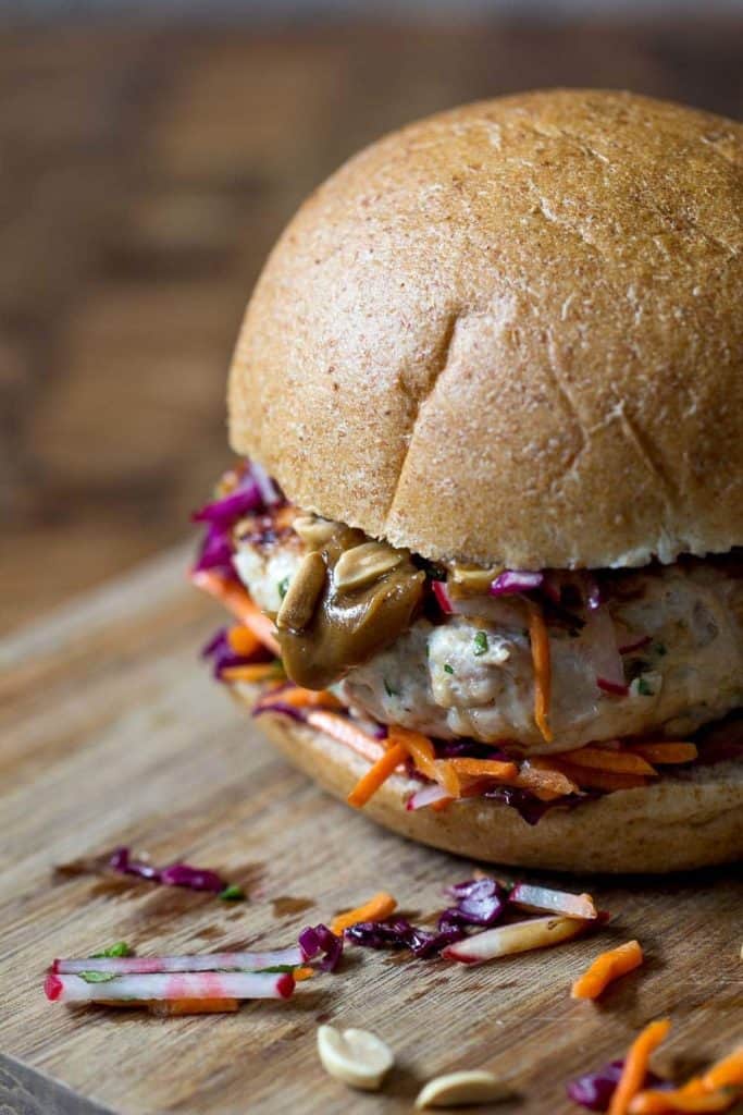These Thai peanut chicken burgers add so much flair to dinner. Inspired by classic Thai flavors, it might be your new favorite burger!