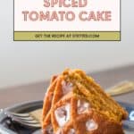 Two slices of tomato cake with spiced white icing are served on a gray plate with a fork; a recipe banner appears above the cake.