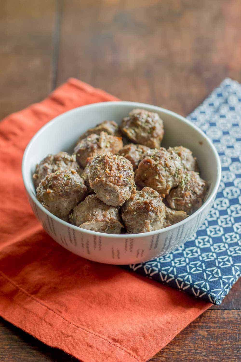 Baked bison meatballs are quick and easy to make any night of the week. Use them for pasta, sandwiches, and more.