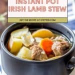 A black and white mug filled with hearty Irish lamb stew, featuring tender lamb, potatoes, carrots, and onions in a savory broth. Text overlay reads “Instant Pot Irish Lamb Stew.”.