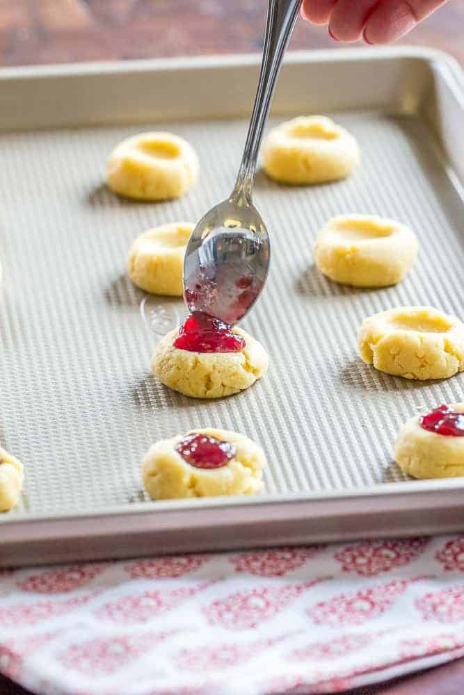 Raspberry jam cookies are shortbread cookies filled with jam for a scrumptious bite.