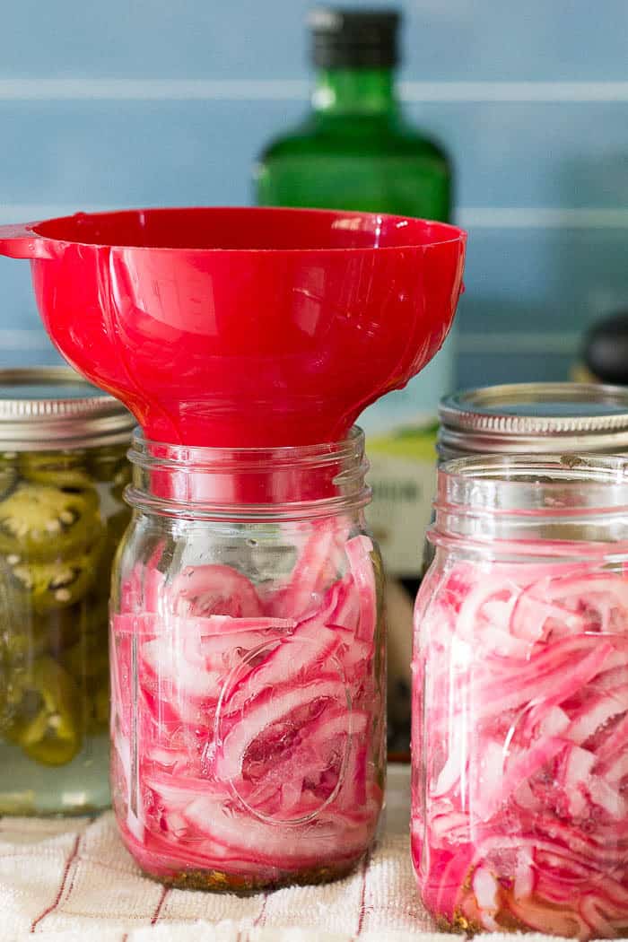 Pickled red onions are an essential topping for tacos, pulled pork, and hot dogs. They're easy to make to keep on hand all year long.