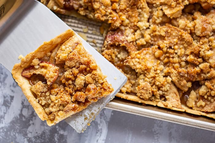 Caramel apple slab pie is a sweet finish for any gathering. Buy caramel sauce or make your own.