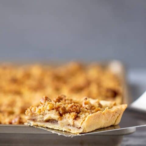 Caramel apple slab pie is a sweet welcome to fall that feeds a crowd. Make it for potlucks, tailgating, or whenever you need to use up some apples.