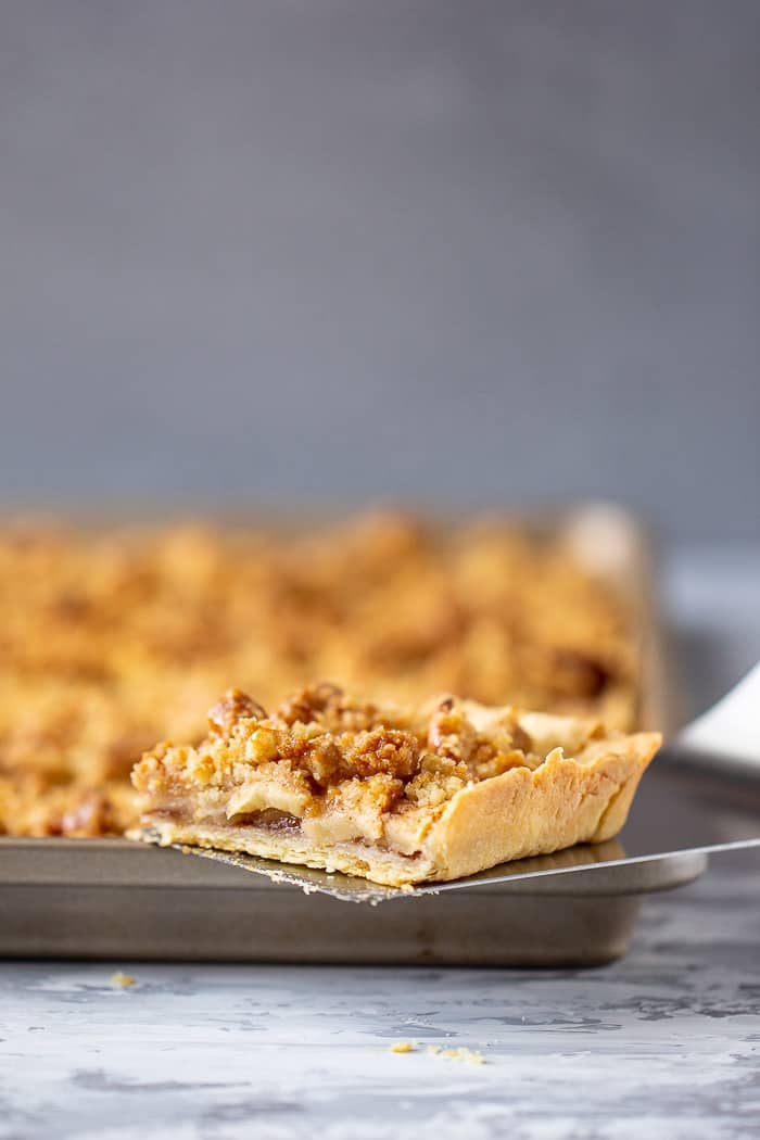 Caramel apple slab pie is a sweet welcome to fall that feeds a crowd. Make it for potlucks, tailgating, or whenever you need to use up some apples.